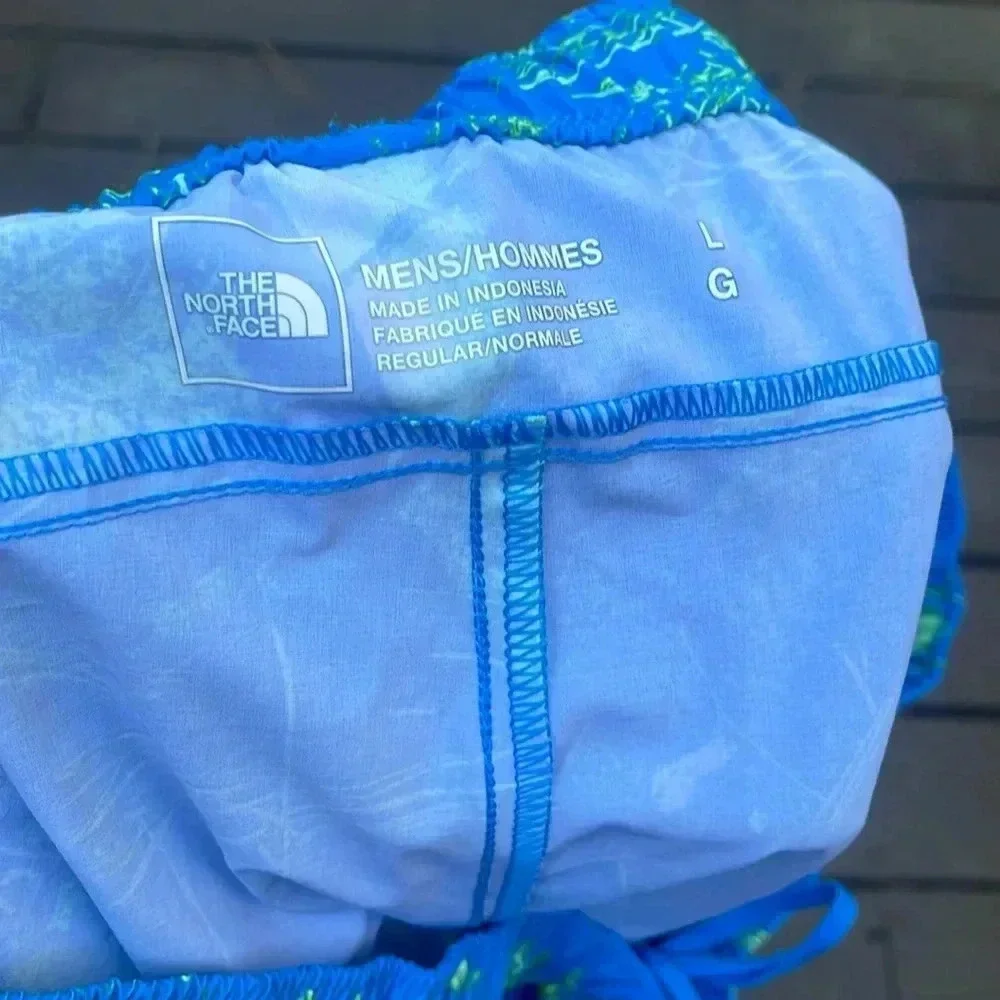 North Face mens blue and green design shorts size large